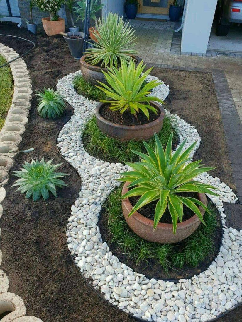 Rải sỏi trang trí tiểu cảnh sân vườn Rải sỏi trang trí tiểu cảnh sân vườn